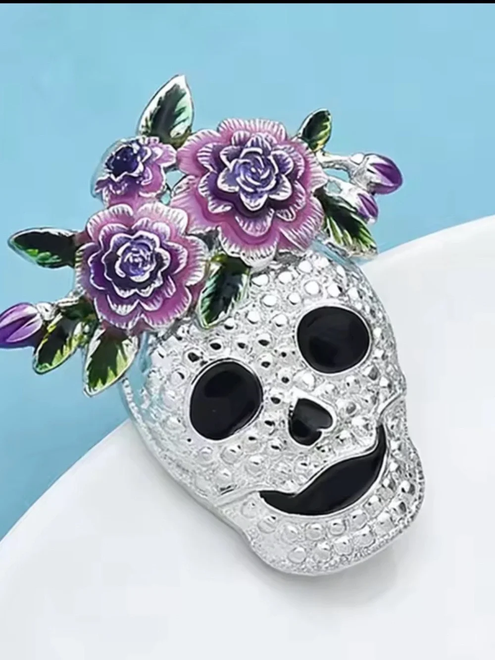 Silver Skull Brooch with Purple Floral Accent